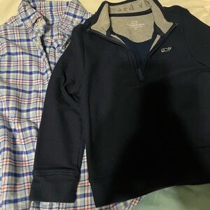 Vineyard vines plaid shirt and navy quarter zip sweater.